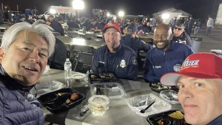 Asm. Muratsuchi and Asm. Gipson dining outside with firefighters