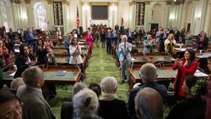 US concentration camp survivors receiving standing ovation from assemblymembers