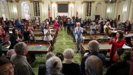 US concentration camp survivors receiving standing ovation from assemblymembers