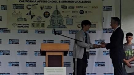 Asm. Muratsuchi receiving honor onstage