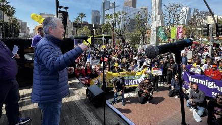 Asm. Muratsuchi onstage, speaking to large crowd