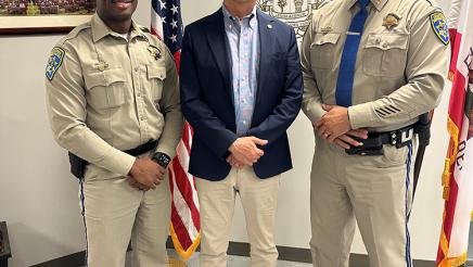 Asm. Maruatsuchi with Capt. Diaz and Public Information Officer Eurin