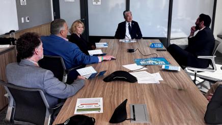 Asm. Muratsuchi at conference table with league members