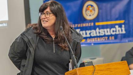 Guest speaker at podium, speaking