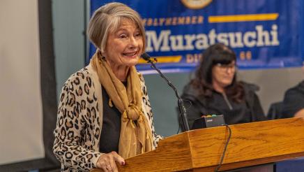 Guest speaker at podium, speaking